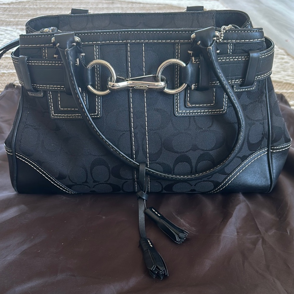 Coach Black Shoulder Bag with Elegant Silver Accents - stored in dust bag